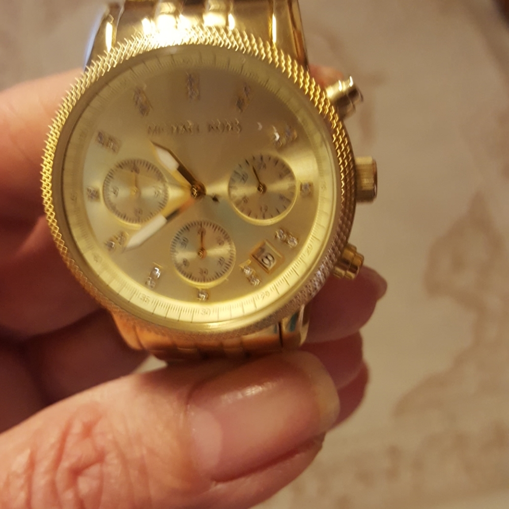 Michael Kors gold watch with crystal embellishment